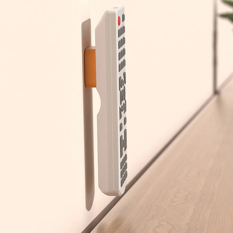supports magnétiques télécommandes tv blanc noir respectueux environnement murale adhesive backing moderne minimaliste