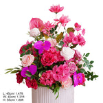 arche fleurs rose vif moderne décoration mariage anniversaire extérieur table blanche doré éléments