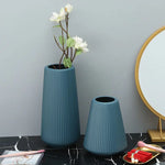 vases décoratifs modernes rayures verticales bleu blanc rose vert pastel minimaliste