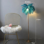 lampe sol moderne plumes blanches dorées bleu turquoise LED éclairage intérieur chambre salon élégant