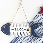 décoration murale plaque bois bleu marine squelette poisson corde bouées rouge bleu