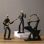 statue musicien moderne abstraite saxophone guitare noire décoration intérieure couple instrumental résine opaque base