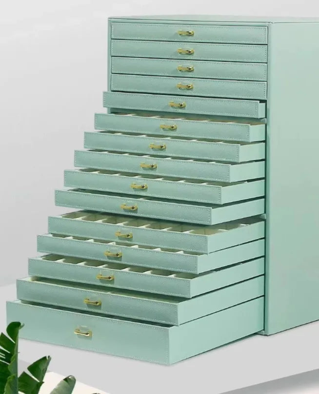 coffret bijoux moderne simili cuir noir blanc vert compartiments poignées dorées stockage sécurité