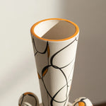 vase céramique moderne blanc noir orange motifs abstraits points bibliothèque décoration