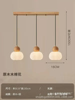 suspension lumineuse trois abatjour bois foncé blanc laiteux moderne minimaliste