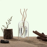 vase verre transparent moderne bouteille diffuseur parfum aromathérapie décoration salon minimaliste