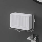 boîte savon moderne blanche rayée adhésive petite plante artificielle
