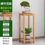 meuble plante moderne gravure traditionnelle marron foncé vases sculpturales or doré