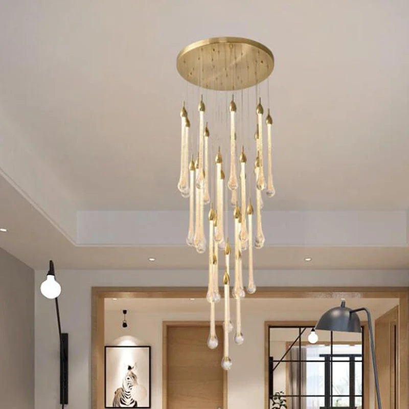 lustre suspension moderne cristal dorées luminaire élégant escalier salon intérieur luxe