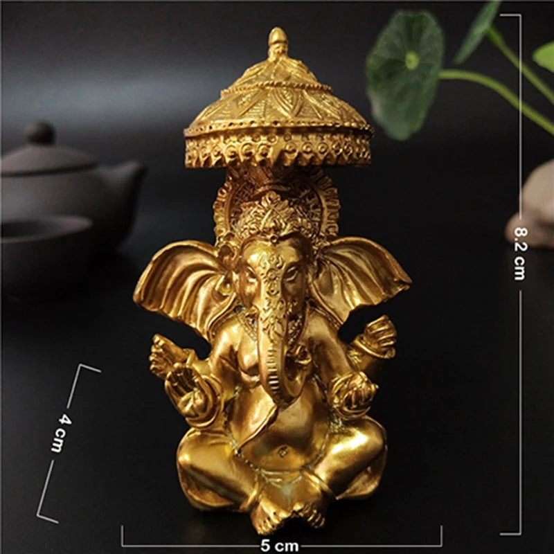 statue ganesha dorée résine ornements complexes décoration intérieure artisanale traditionnelle bouddhiste éléphant multiple bras