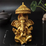 statue ganesha dorée résine ornements complexes décoration intérieure artisanale traditionnelle bouddhiste éléphant multiple bras