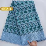 tissu dentelle fleurs vert bleu violet rose beige brodé occasionnelle traditionnelle