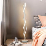 lampe sol moderne spirale noir blanc LED minimalist éclairage salle manger chambre