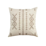 coussin carré beige clair motif géométrique moderne broderie lignes triangles décoration salon maison