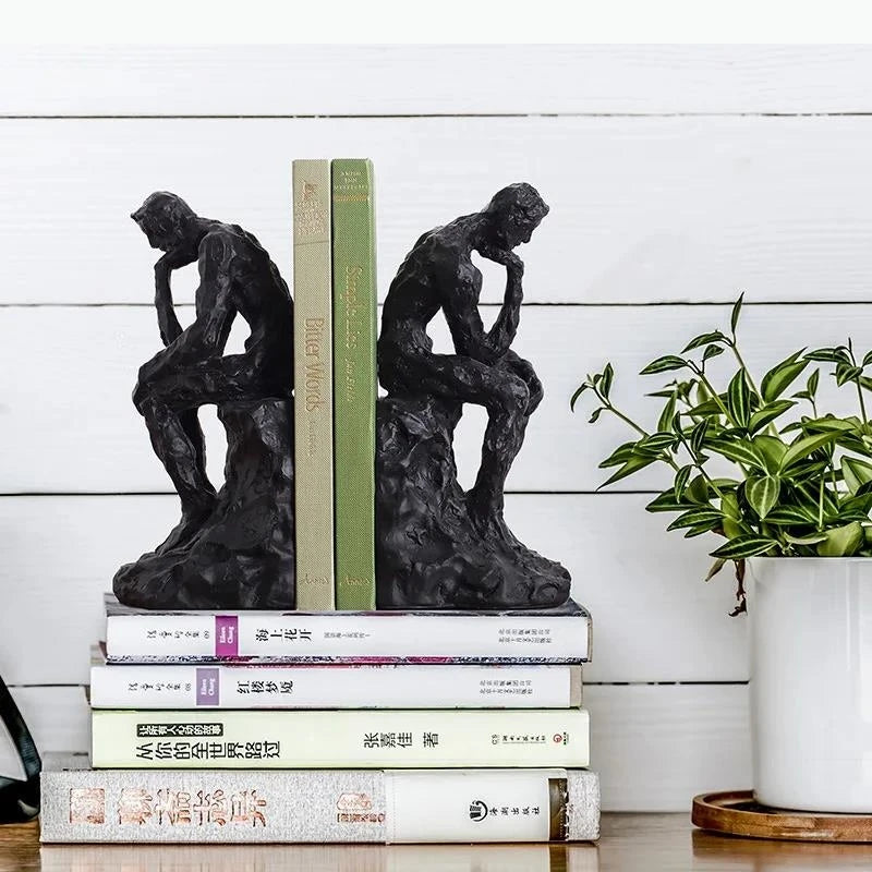 statue livre sculptée moderne noir blanche décor pensé matière organique gens