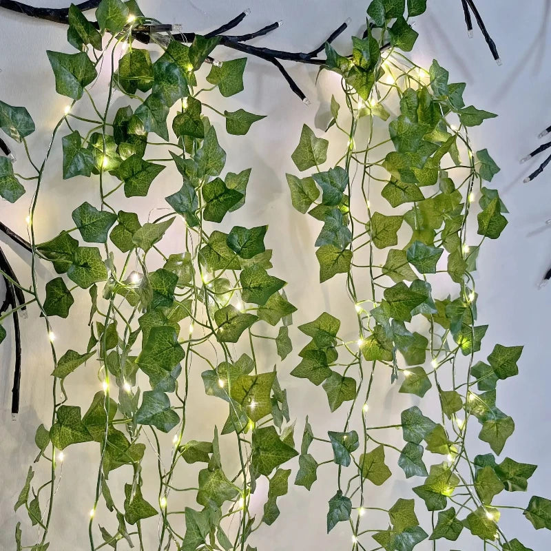 guirlande lumineuse artificielle feuilles vertes lumières led blanc decoration intérieure extérieure noël moderne