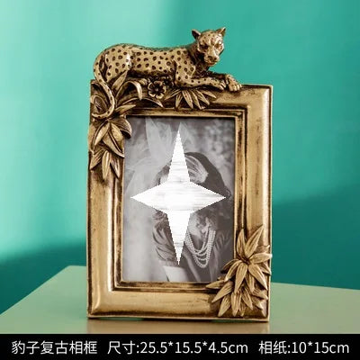 cadre photo or feuilles sculptées vintage opalescent fixation papillon métal doré