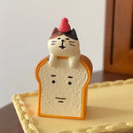 figurine animale kawaii résine blanc marron noir rose gris chapeau ruban bakery open chocolate