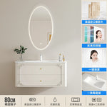 meuble salle bain noir blanc tiroirs vasque ornements dorés classique fixations murales accessoires cosmétiques