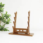 support épées bois moderne minimaliste noir brun clair katana sabres rack display salon