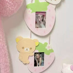 cadre photo mural rose vert feuille verte visage mignon enfantin décoration chambre suspendu crochets