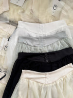 jupe élastique minijupe dessus genou élégante tulle noir blanc féminine chic translucide boutons
