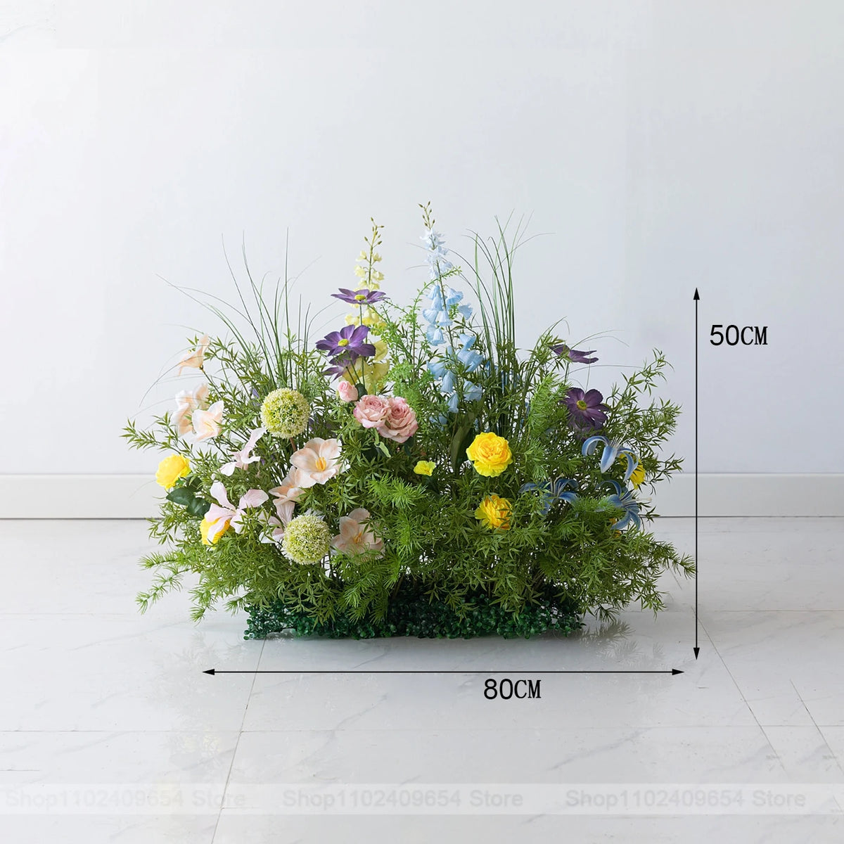 décoration murale bouquet fleurs artificielles roses blanches jaunes bleues feuilles vertes mariage fête événement