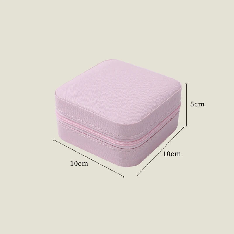 boîte bijoux simili cuir vert pastel moderne fermeture glissière blanc rose pâle boucles doreilles