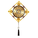 horloge murale or noir motif géométrique tissu classique tassel moderne