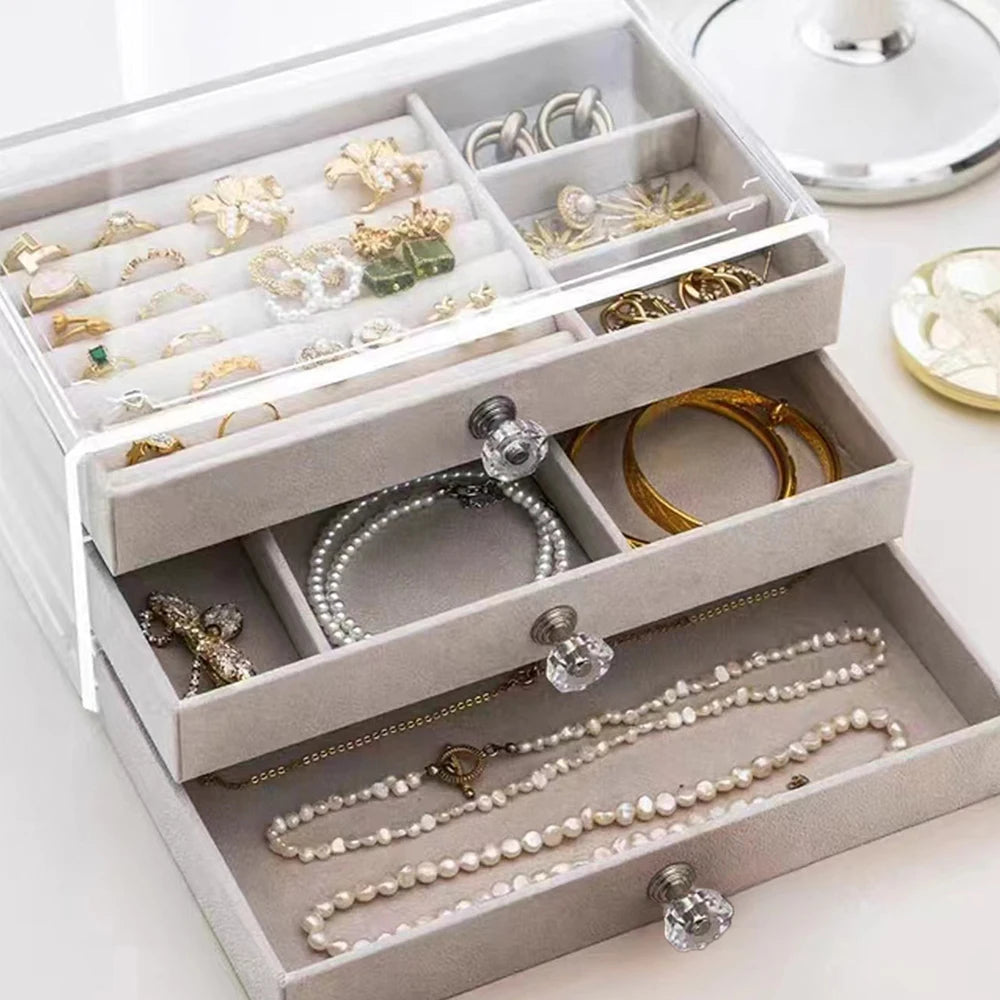 boîte rangement bijoux moderne beige transparente velours poignées cristal boucles oreilles bracelets colliers