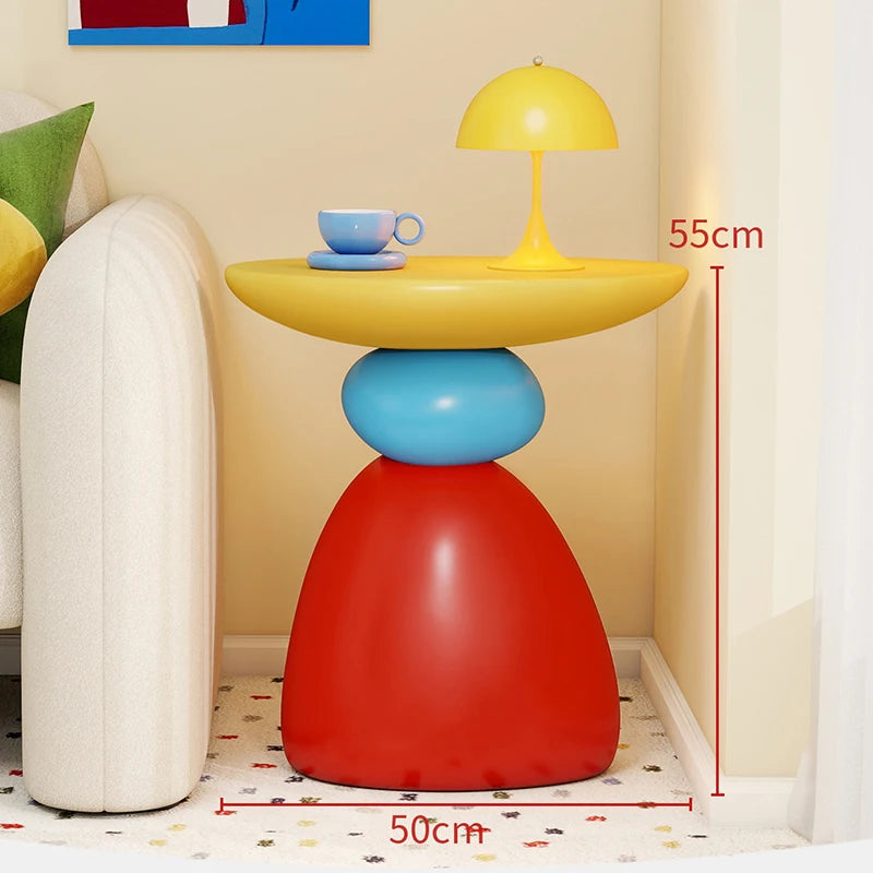 table basse ronde pierre moderne minimaliste sculptural couleur vive salon