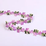 ruban decoratif brode fleurs motifs floraux couleur rouge rose vert blanc jaune solvable eau