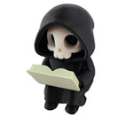 figurine gothique squelette lecture statuette fantôme noire minimaliste texture matestone livre blanc