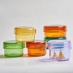 boîtes rangement verre transparentes modernes couleurs vert orange jaune rose clips papier respectueux environnement