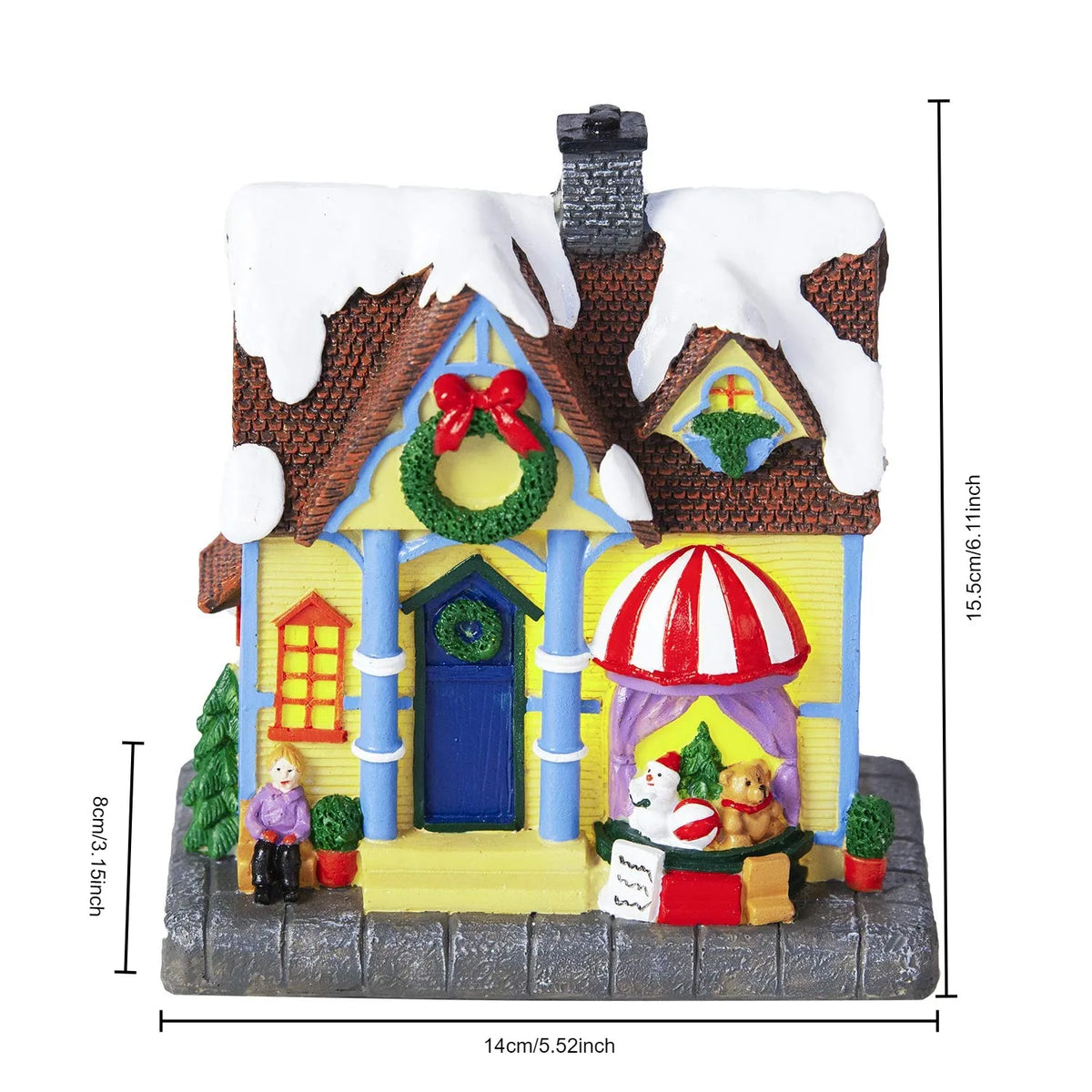Maison de Noël allumée dans l'obscurité