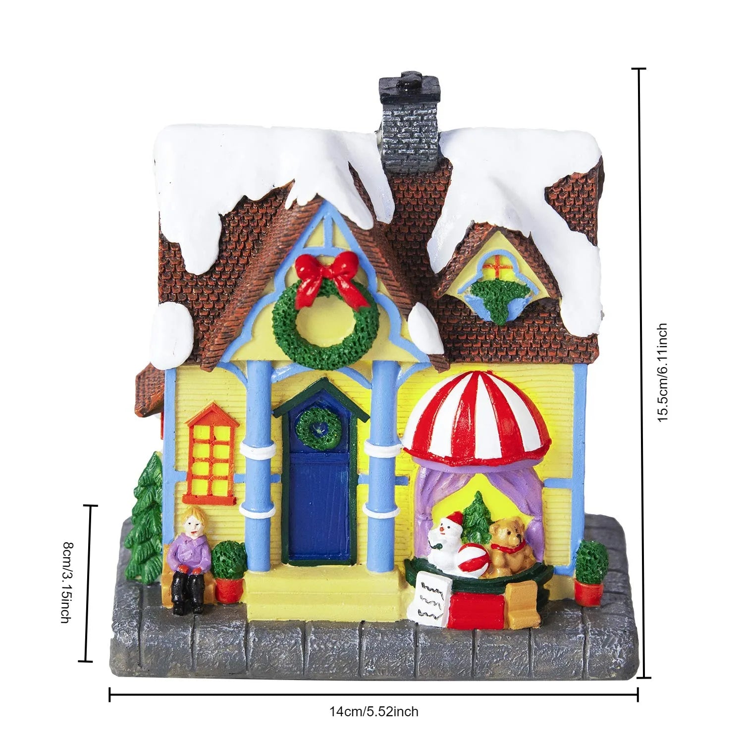 Maison de Noël allumée dans l'obscurité