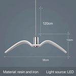 suspension lumineuse moderne oiseau stylisé blanc noir éclairage salon chambre led résine intérieur