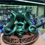 statue serpent tête crâne argent bleu vert motifs floraux artisanal feng shui maison
