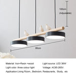 lampe suspendue moderne minimaliste led gris blanc rose jaune bleu oiseaux résine bois