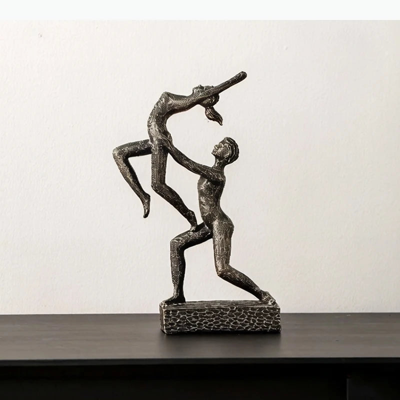 sculpture moderne danseurs figures humaines interaction dynamique penseur livres étagère decoration abstraite chaleur coloris