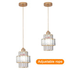 Suspension lumineuse transparente moderne rangs verre dorés élégante chambre salon