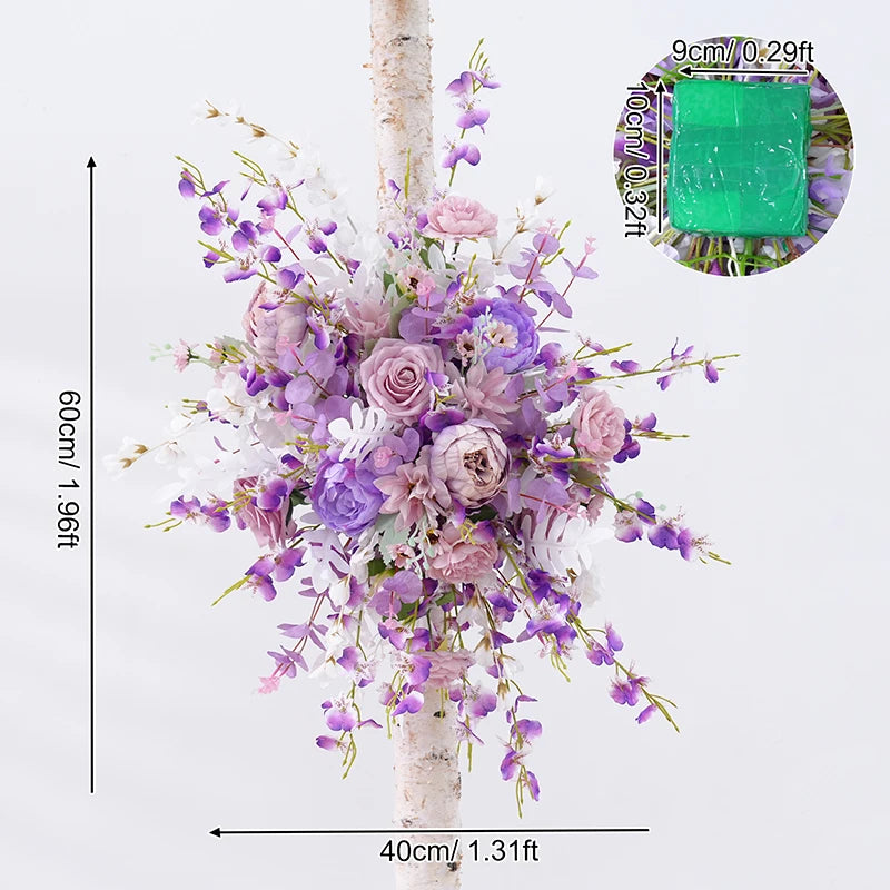 arche mariage fleurs artificielles tissu translucide blanc violet décor romantique extérieur événement table centreDecoration