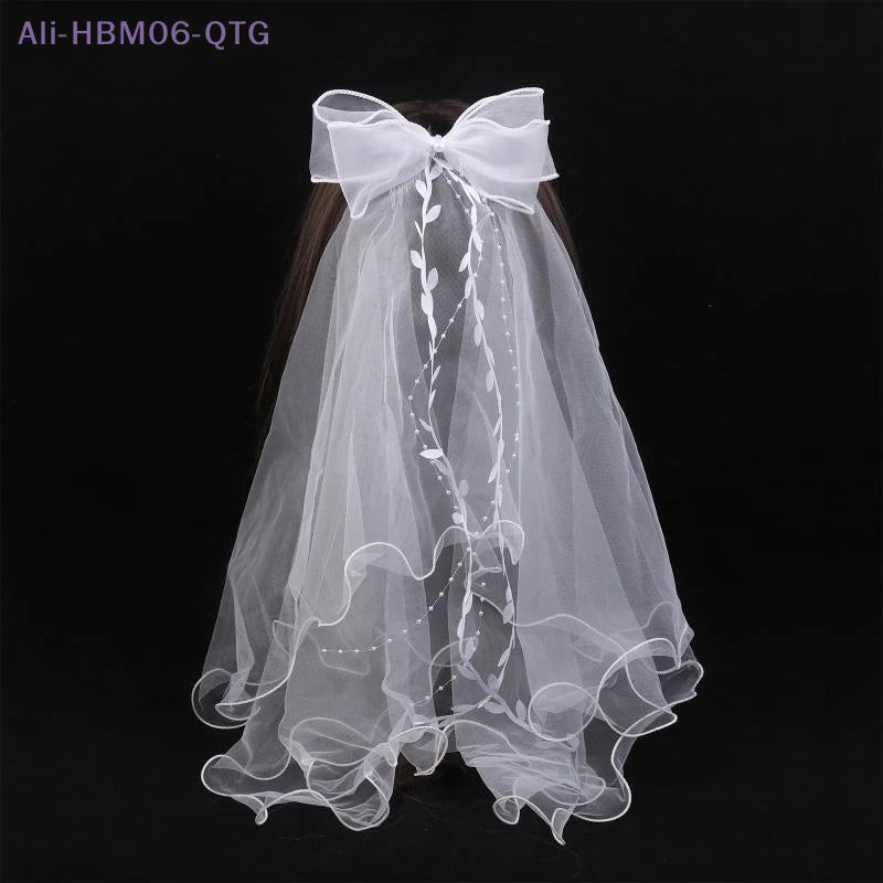 voile mariée blanc translucide fronces élégante détails florauxarrière noeud décoratif