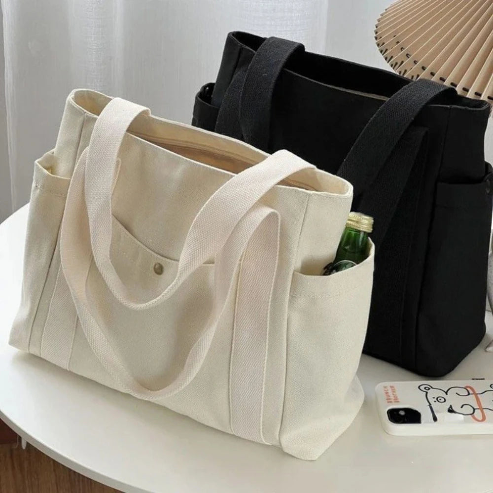 sac cabas blanc cassé noir toile décontracté minimaliste poches boutons anses longues