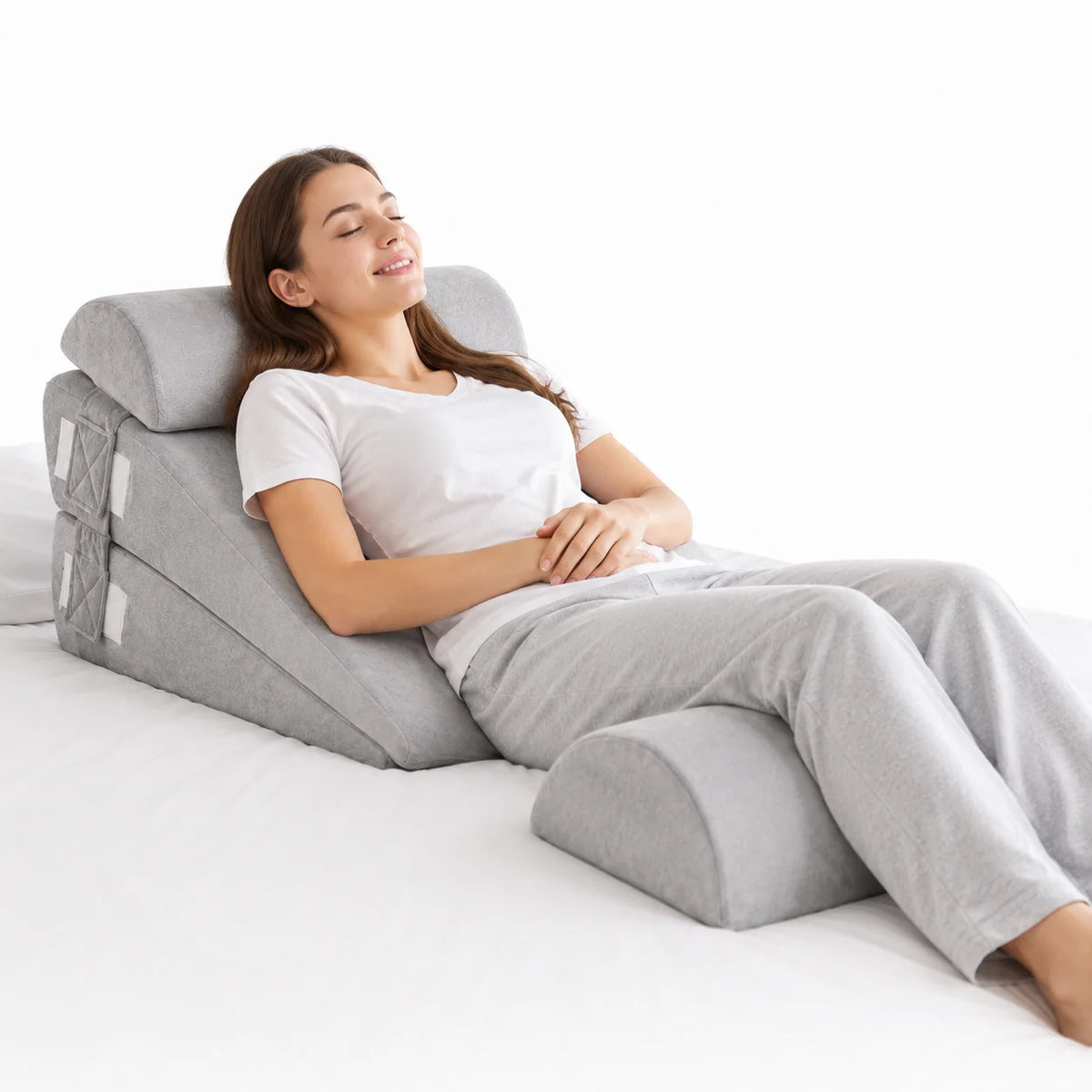 coussin coin mousse mémoire forme ergonomique tissu polyester velours gris confortable relaxant rouleau cylindrical