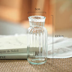 vases verre transparents texturés lignes verticales horizontales motifs petits bosses