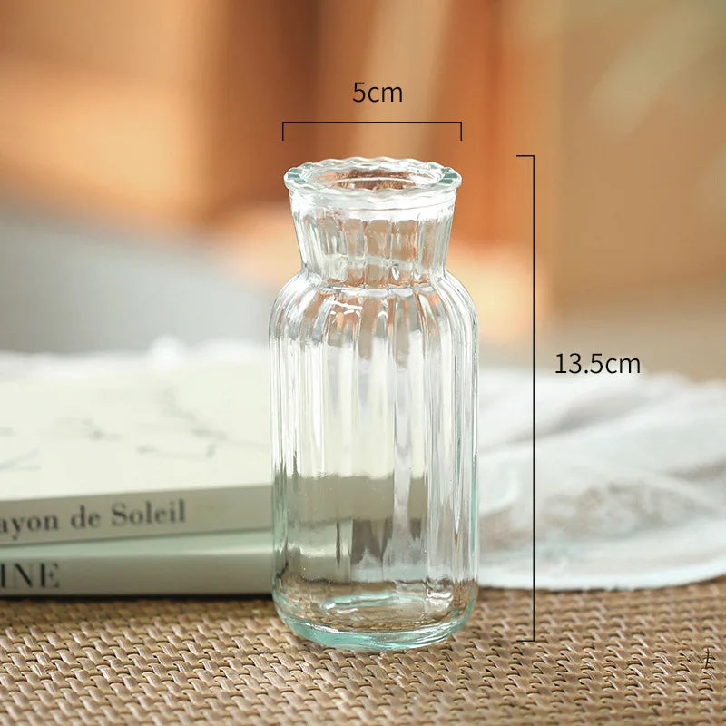 vases verre transparents texturés lignes verticales horizontales motifs petits bosses