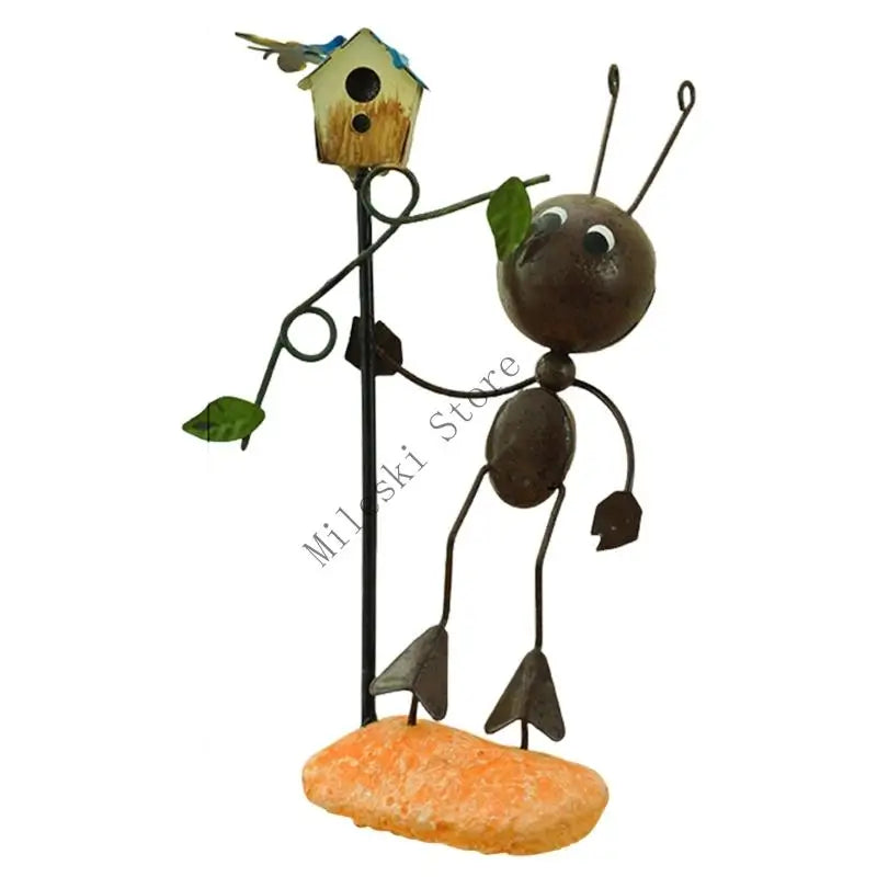 figurine métallique jardin feuilles fleurs décor extérieur moderne artisanal noir bleu vert orange blanc