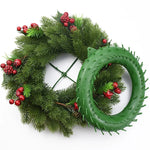 décoration noël couronne verte moderne branches baies rouges cônes pin taille 15 20 25