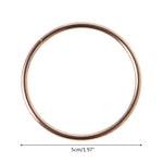 anneaux suspension dorés ronds concentriques métal opaques tailles variées moderneintérieurcoration minimaliste